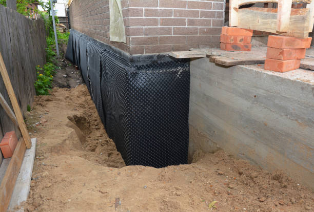 Happy homeowners after waterproofing job in White House